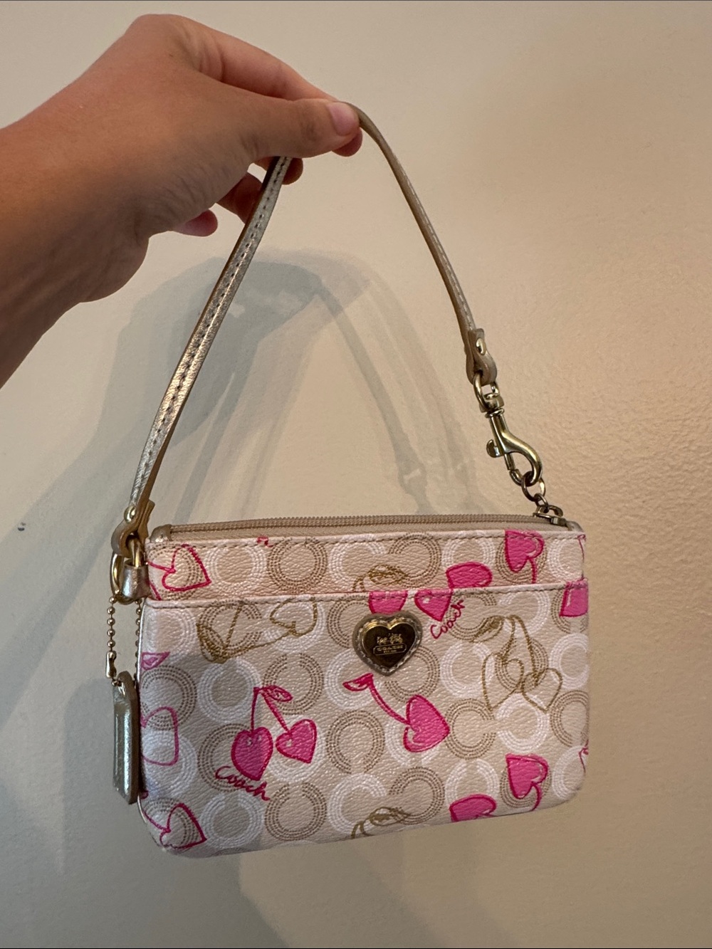 Coach White Signature Mini Wristlet with Pink Heart Print